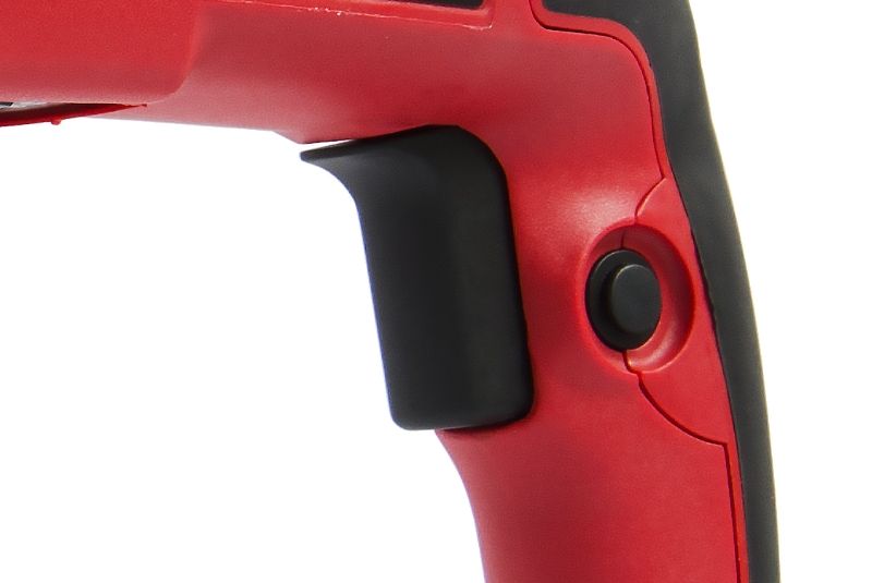 Кнопка включения и фиксатор на рукоятке перфоратора.