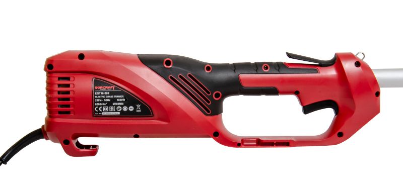 Блок двигателя электрического триммера WORCRAFT крупным планом.