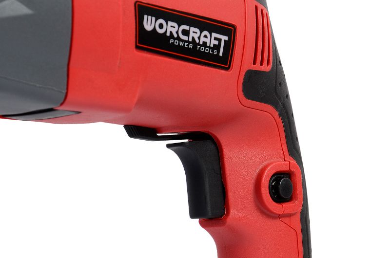 Кнопка включения перфоратора WORCRAFT RH09-26A крупным планом.